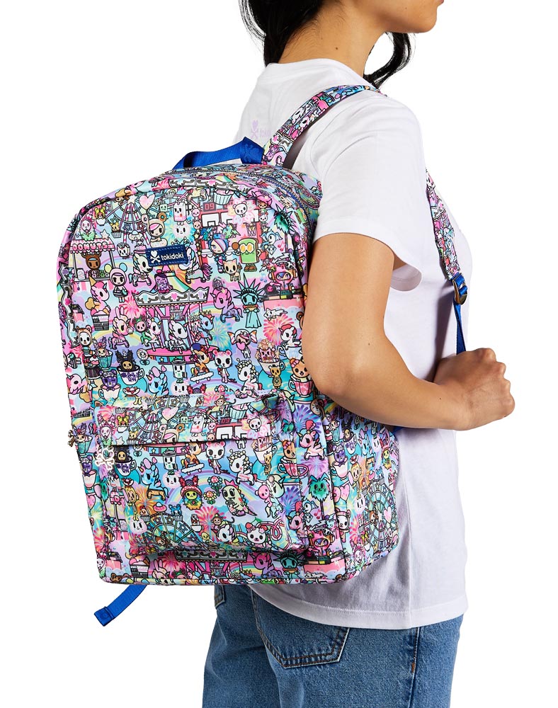 woman with cotton candy carnival backpack